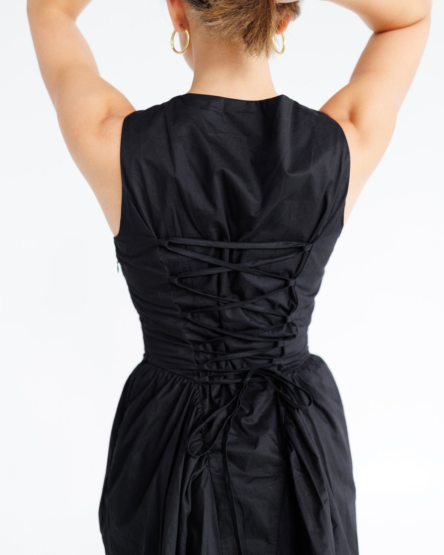 Lace Up Back Basque Waist Puff Mini Dress | Black Noelani The Label Lace Up Back Basque Waist Puff Mini Dress | Black Noelani The Label
