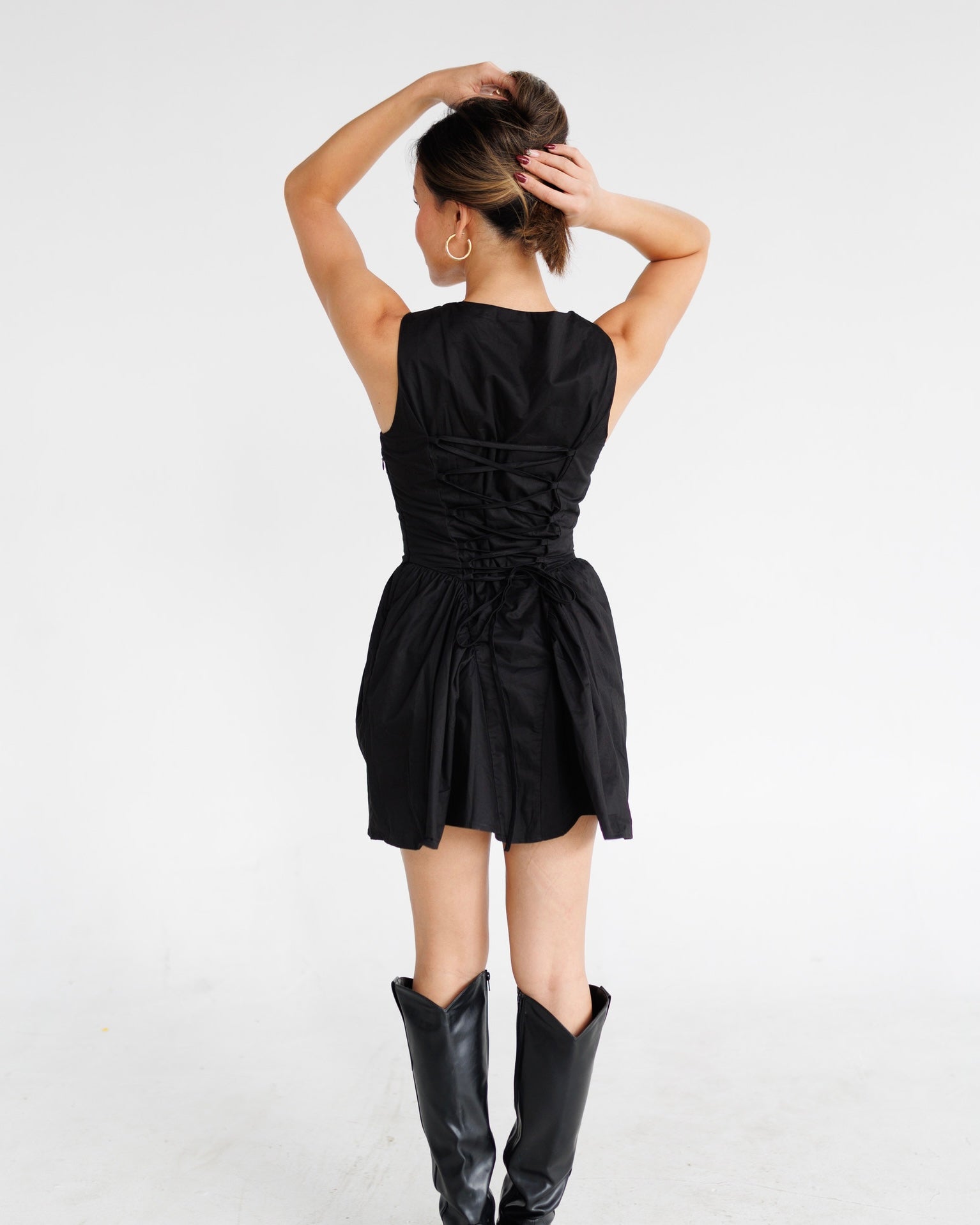 Lace Up Back Basque Waist Puff Mini Dress | Black Noelani The Label Lace Up Back Basque Waist Puff Mini Dress | Black Noelani The Label